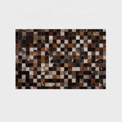 China Stain Resistant 2021 New Square Patchwork Cowhide Blankets For Living Room for sale