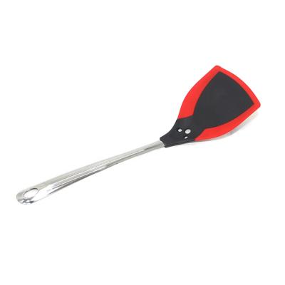 China Durable Kitchen Cooking Nylon Silicone Battery Solid Spatula Turner With Stainless Steel Handle for sale