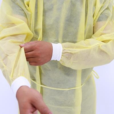 China Yellow Reinforced Safety Protective Isolation Gown Surgical Gowns Disposible Gown For Hospital for sale