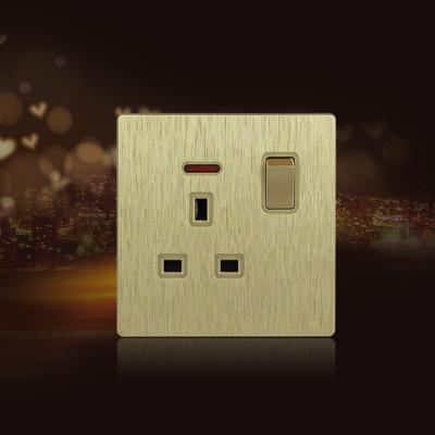 China UK Standard 2020 New Design PC Materials Brushed Gold Color 13A Flat Switched Socket With Neon for sale