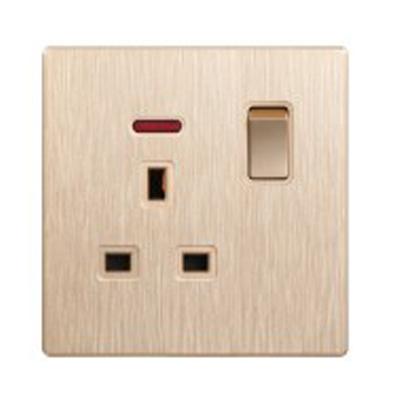 China UK Standard Materials Brushed PC Bestselling 13A Gold Color Switched Socket With Neon for sale