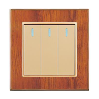 China UK Standard Best Price High Quality Wooden Color 3 Strip 1 Way Wall Switch Light for sale