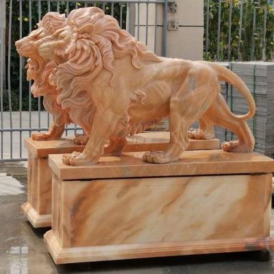 China Modern Garden Decor Luxury Sculpture Hand Carved Sunset Lion Red Marble Statue for sale