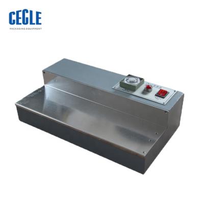 China CW-115 Perfume Box Chemical High Quality Cellophane Wrapping Machine for sale