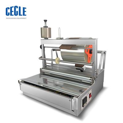 China New ACW-88 CECLE food cellophane soap wrapping machine and cello wrap machine for sale