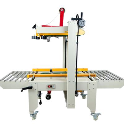 China FXJ6050 Automatic Left and Right Drive Food Band Carton Box Carton Sealer Case Packing Sealing Machine for sale