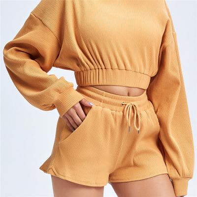 China Fashion Casual Sporty Pieces QUICK DRY Both Set Crop Top Hoodie And Drawstring Skinny Shorts With Pockets Women Sweatsuit for sale