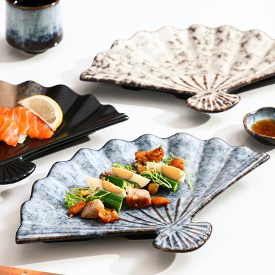 China Wholesale Modern Sustainable Japanese Style Matte Black White Marble Irregular Ceramic Sushi Propeller Shaped Dish for Restaurant Hotel for sale