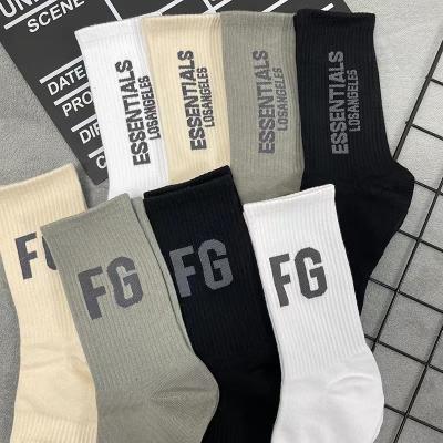 China QUICK DRY FEAR OF GOD BASICS bangs European brand stockings and American street sports luminous socks FOG socks for men and women for sale