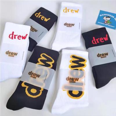 China DREW Smiley Face Letters QUICK DRY European and American Street Bieber the same fashion trend men's and women's sports drew 100% custom-made socks for sale