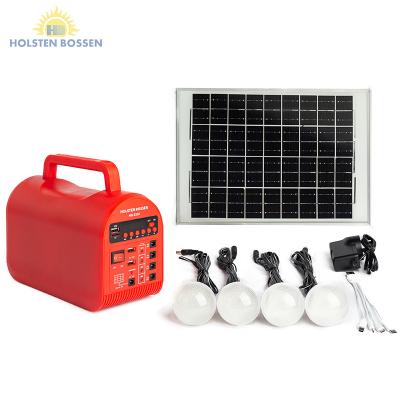 China Home All In One Generator Solar Power Lighting System Panel Energy Storage Light Radio System Kit With Fm Radio Bulbs for sale