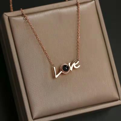 China JM OEM Romantic Wholesale English Letter Love Charms Custom 100 Languages ​​Stainless Steel Jewelry I Love You for sale