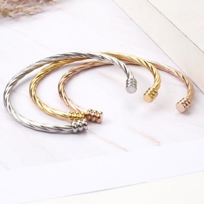 China Punk JM 316L 18K Gold Plated Twisted Line Texture Stainless Steel Screw Bracelet for sale