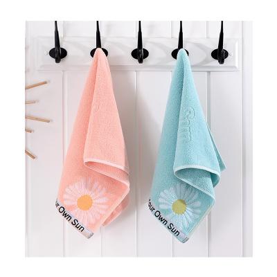 China Hot-selling couples towel small daisy jacquard water absorption new cotton face towel household fresh pink towel for sale