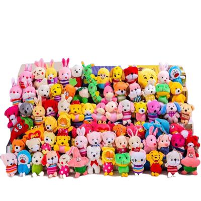 China Cute mixed wholesale a variety of plush cute little doll head cartoon chain pendant for sale