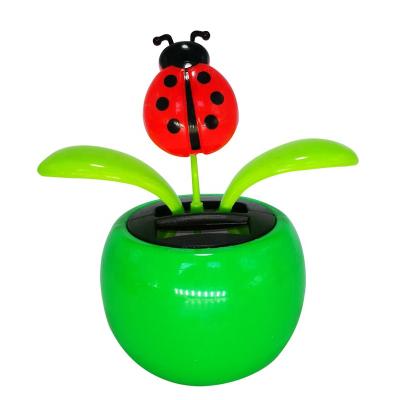 China Battery Flip Flap Dancing Flower For Car Decor Solar Powered Automatic Dancing Flower Without Flower for sale