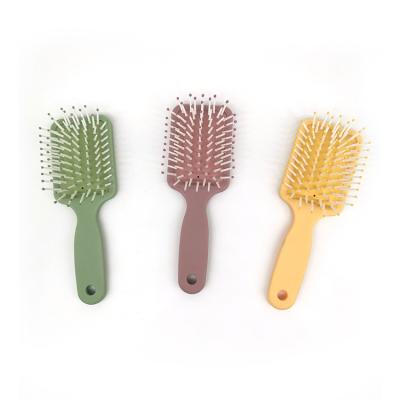 China Hot Selling Detangling Colorful Wave 360 ​​Massage Waterproof Plastic Curly Hair Styling Salon Hairdressing Comb Accept Customized for sale