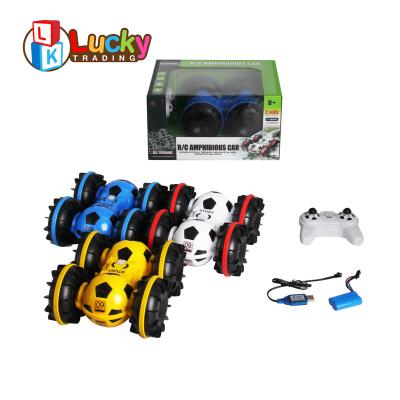 China RC Hobby 2.4g Stop Waterproof Bilateral Tank Toys Amphibious Four Wheel Drive Radio Control Stunt Car for sale