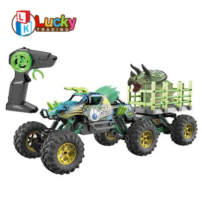 China Electric Toy 1:14 Hobby 4WD RC Car Rc Remote Control Monster Truck With Dinosaur for sale