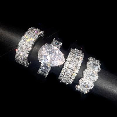 China Exquisite Appearance 2022 New Arrived Sparkling Bling Iced Out Women Wedding Engagement Diamond Ring Pear Cut Out Ring Baguette Eternity Ring for sale