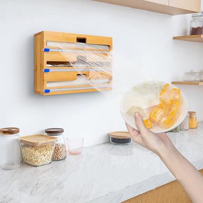 China Modern 3 in 1 Aluminum Foil and Plastic Wrap Wax Paper Organizer Bamboo Kitchen Foil Organizer Dispenser for Drawer for sale