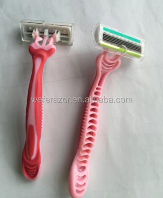 China Triple Blade Disposable Razor Blade Razor Rubber Handle for sale