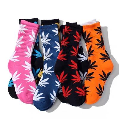 China New Sustainable Fashion Knitting Socks Maple Leaves Jacquard Skateboard Crew Socks Teen Knitting Socks for sale