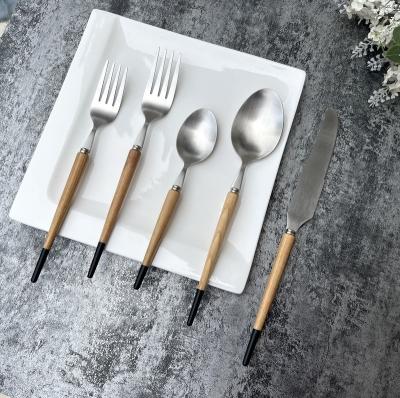 China Viable Wooden Handle Flatware Set with Black Paint Silverware 18/10 Stainless Steel Natural Ash Wood Flatware Set of 5 for sale