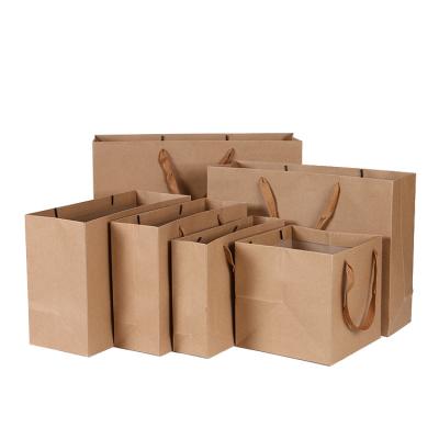 China Los bolsos planos del regalo de Brown del llano de la manija modificaron el artículo biodegradable del logotipo para requisitos particulares en venta