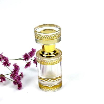 China Global Luxury Custom Gold Engrave Logo 3ml Glass Cylindrical Shape K9 Essential Oil Perfume Bottle Crystal Wedding Favor for sale