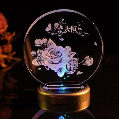 China Global Wholesale Romantic Beautiful Gifts 3D Laser Round Shape Crystal Glass Photo Frame With Led Light Base For Birthday Gift for sale