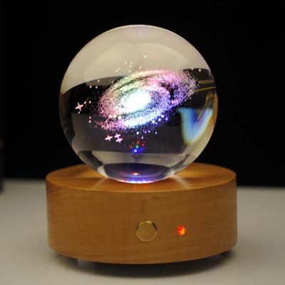 China Solar Night Light Projection LED Novelty System World Globe Music Box Carved Rotating Crystal Ball for sale