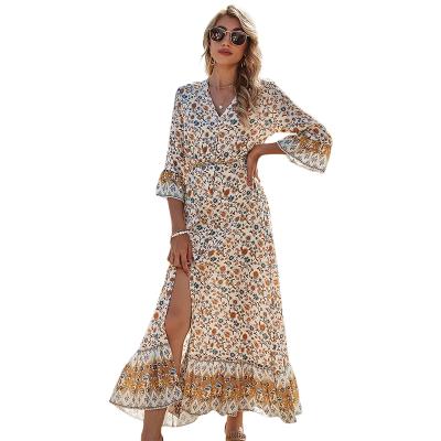 China Anti-wrinkle Women's V-Neck High Waist Dress Female 2021 Casual Split Bohemian Spring New A Line Dress for sale