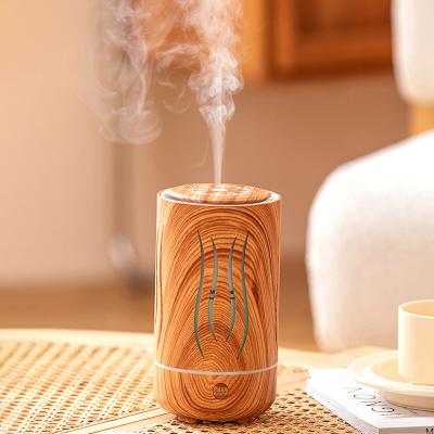 China New style mini aroma oil diffuser electric humidifier wood diffuser for essential oils with 7 colors for sale