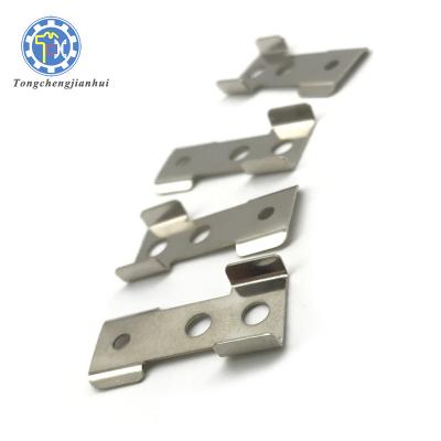 China Precision Coil Customized Sheet Metal Stamping Silver Plated Stainless Steel Battery Contact Clip for sale