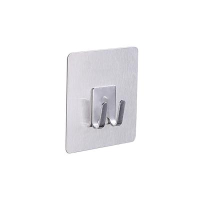 China Modern Minimalist Paste Stainless Steel Strong Wall Mounted Clothes Hanger Self Adhesive Wall Mounted Hook Hanger for sale