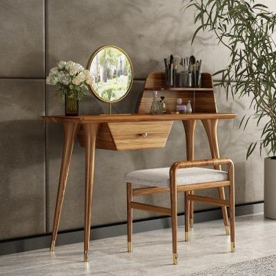 China Simple and elegant modern bedroom dressing table modern solid wood legs all wood ebony log color wooden dressing table for sale