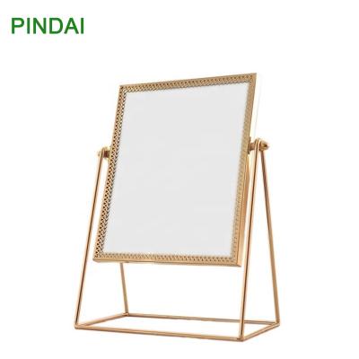 China Double Sided Dial Gold Metal Rectangle Shape Mirror Rotate Stand Up Vanity Mirror for sale