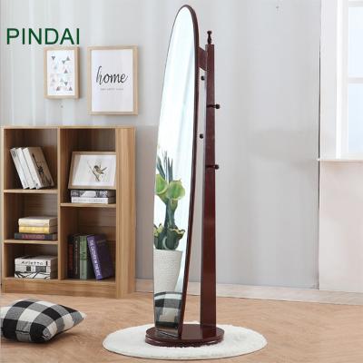 China Multifunctional Floor Standing Cosmetic Mirror Frame Integral Wooden Mirror With Shelf for sale