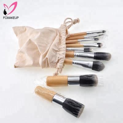 China Angular Blush 10pcs Eco Bamboo Makeup Brush Set Kabuki Foundation Brush Kit By Cloth Pouch Bag for sale