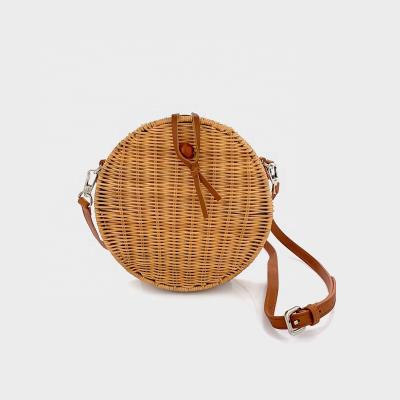 China Fashion Summer Beach Rattan Sling Bag Bali Women Handmade Rattan Straw Round Cross - Body Bag for sale