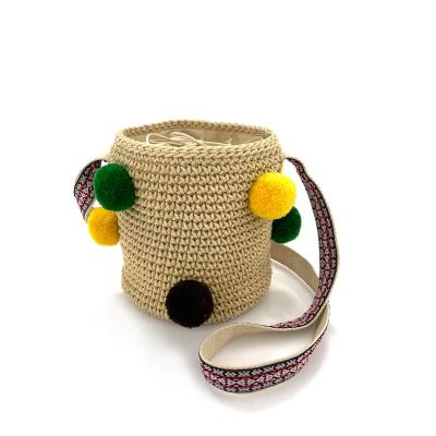 China 2021 Style Soft Crochet Hand & Bucket Bag Summer Beach Woven Colorful Pom Pom Straw Bag for sale