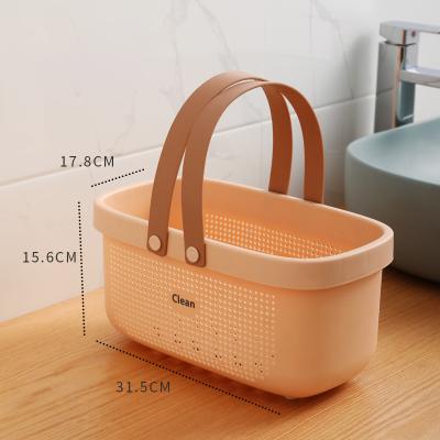 China Sustainable Portable Bath Storage Basket Handle Design Plastic Bathroom Storage Basket for sale