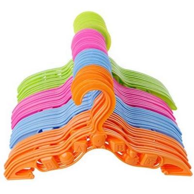 China Sustainable Multicolor Baby Plastic Coat Hangers Non Slip Cartoon Child Baby Clothes Rack for sale