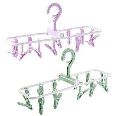 China Travel Viable Foldable Clips Portable Plastic Clothespins Drip Hangers Baby Drying Rack Lingerie Hanger Underwear Peg Dryer for sale