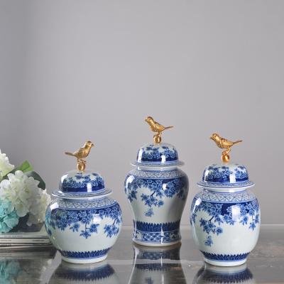 China Contemporary BLUE AND WHITE CERAMIC HOME DECOR PATTERN DECORATIVE CERAMIC POTS WITH METAL LID for sale