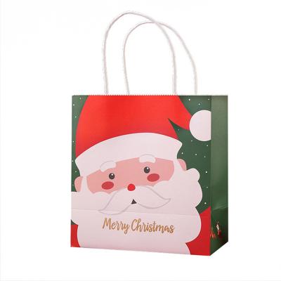 China Santa Claus Cartoon Biodegradable Packaging Paper Bag Print Custom Christmas Shopping Gift Biodegradable Paper Bags for sale