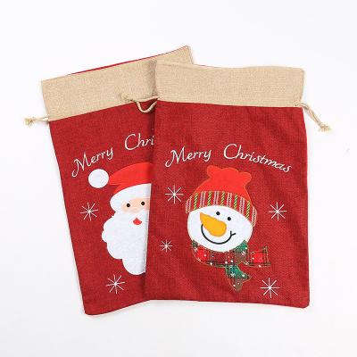 China Hot Sale Eco-Friendly Large Canvas Drawstring Bag Printed Santa Sack Candy Bag Personalized Custom Christmas Bags Bag For Gifts for sale