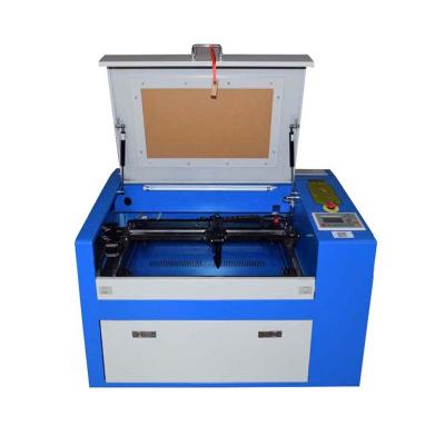 China Best Selling 40W 50W 60W Air Cooled Desktop 3050 Mini Laser Cutting Engraving Machine Desktop Mini Laser Engraving Machine for sale