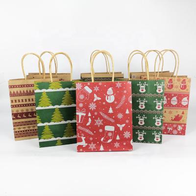 China Recyclable Different Design Type Gift Wrapping Christmas Cardboard Bag Paper Bag For Kids for sale